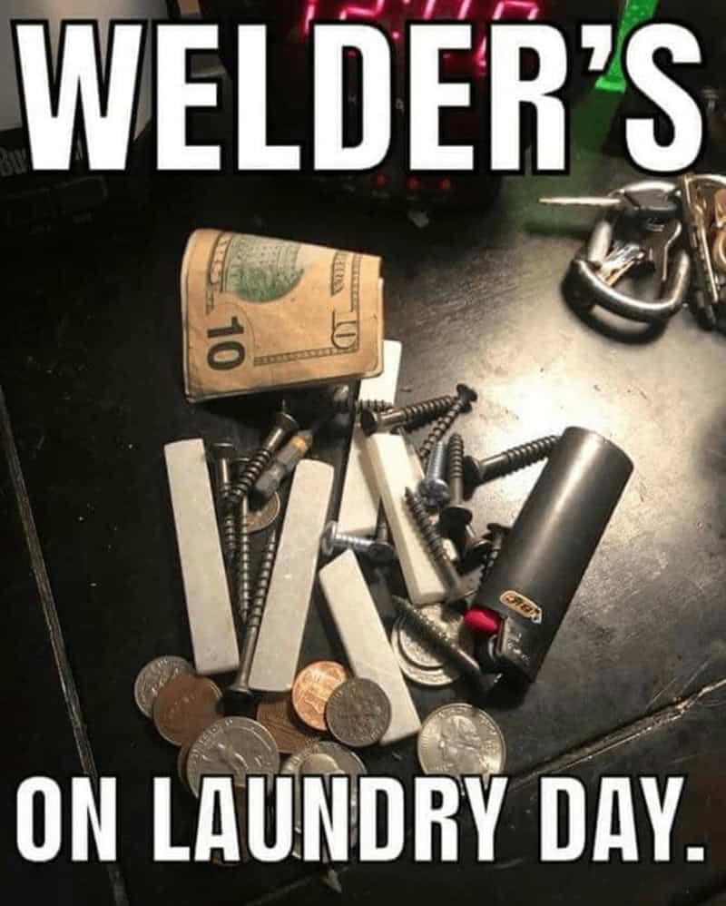 A photo of the random and assorted contents of a welder's pockets after laundry day, which includes money, a lighter, and a large pile of loose screws and other parts.