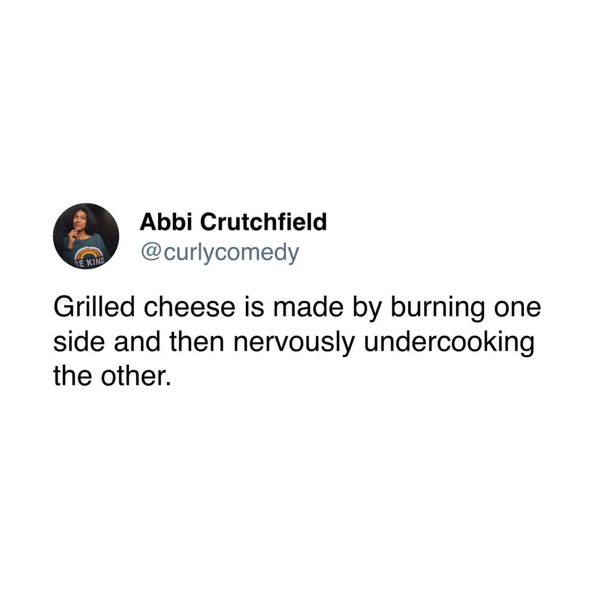 A funny cooking meme tweet describing how a grilled cheese is made by burning one side.