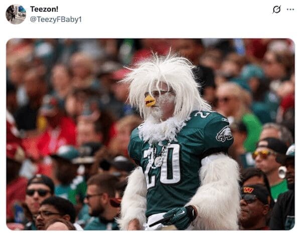 A dedicated Philadelphia Eagles fan dressed up in an impressive and wild-looking full-body eagle costume.