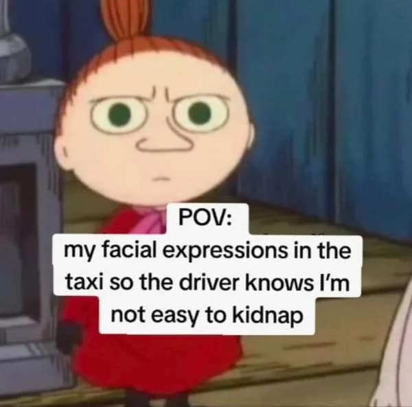 A deep meme using a Moomin character's angry face to describe looking tough in a taxi so the driver knows you're not easy to kidnap.