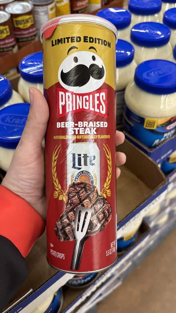 A can of limited edition Pringles with a unique beer-braised steak flavor made in partnership with Miller Lite beer.