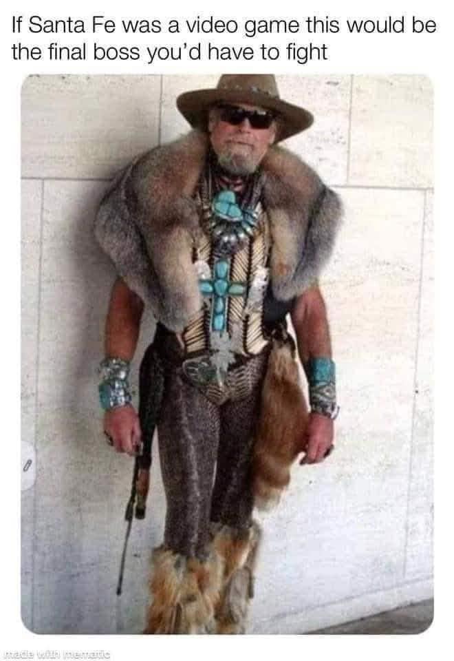 A funny meme of a man in a wild and flamboyant outfit who looks like the final boss of Santa Fe, New Mexico.