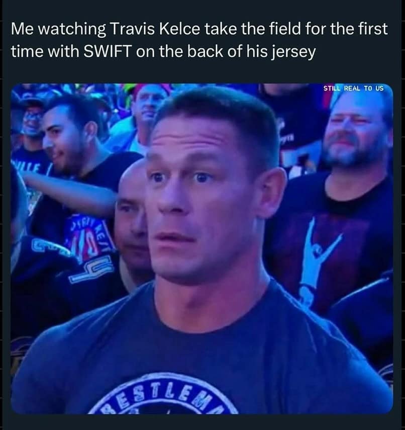 A funny reaction meme of a shocked John Cena imagining NFL star Travis Kelce wearing a Taylor Swift jersey.