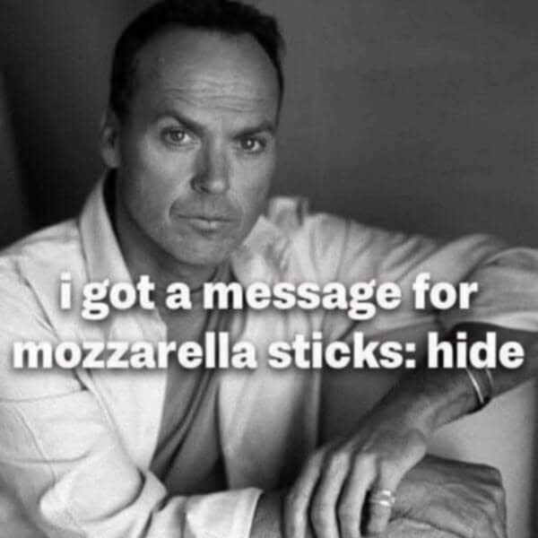 A funny meme with a serious picture of actor Michael Keaton threatening to eat all the mozzarella sticks.