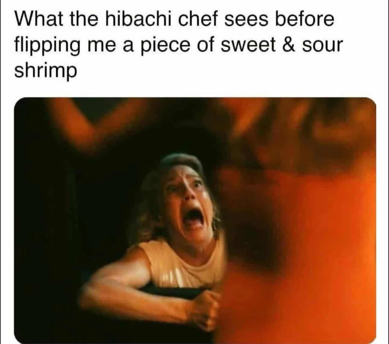A popular and funny meme of a terrified woman from a horror movie, which is used to represent the intense fear and pressure of trying to catch a piece of shrimp from a hibachi chef.