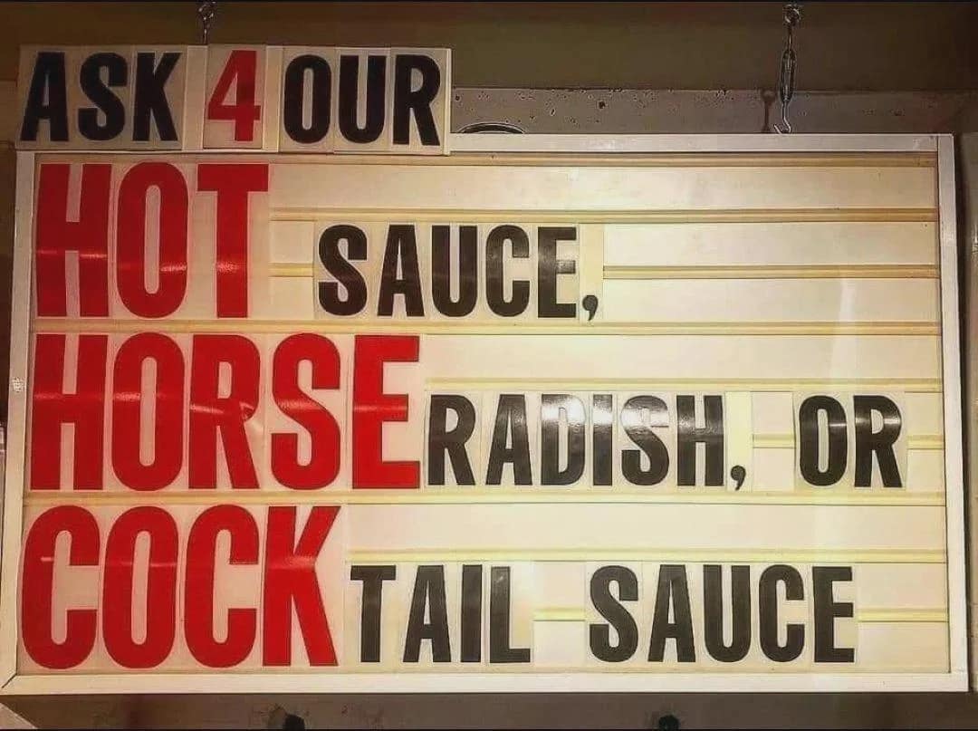 A funny sign with terrible letter spacing that looks like it's advertising "hot horse cock" sauce to customers.