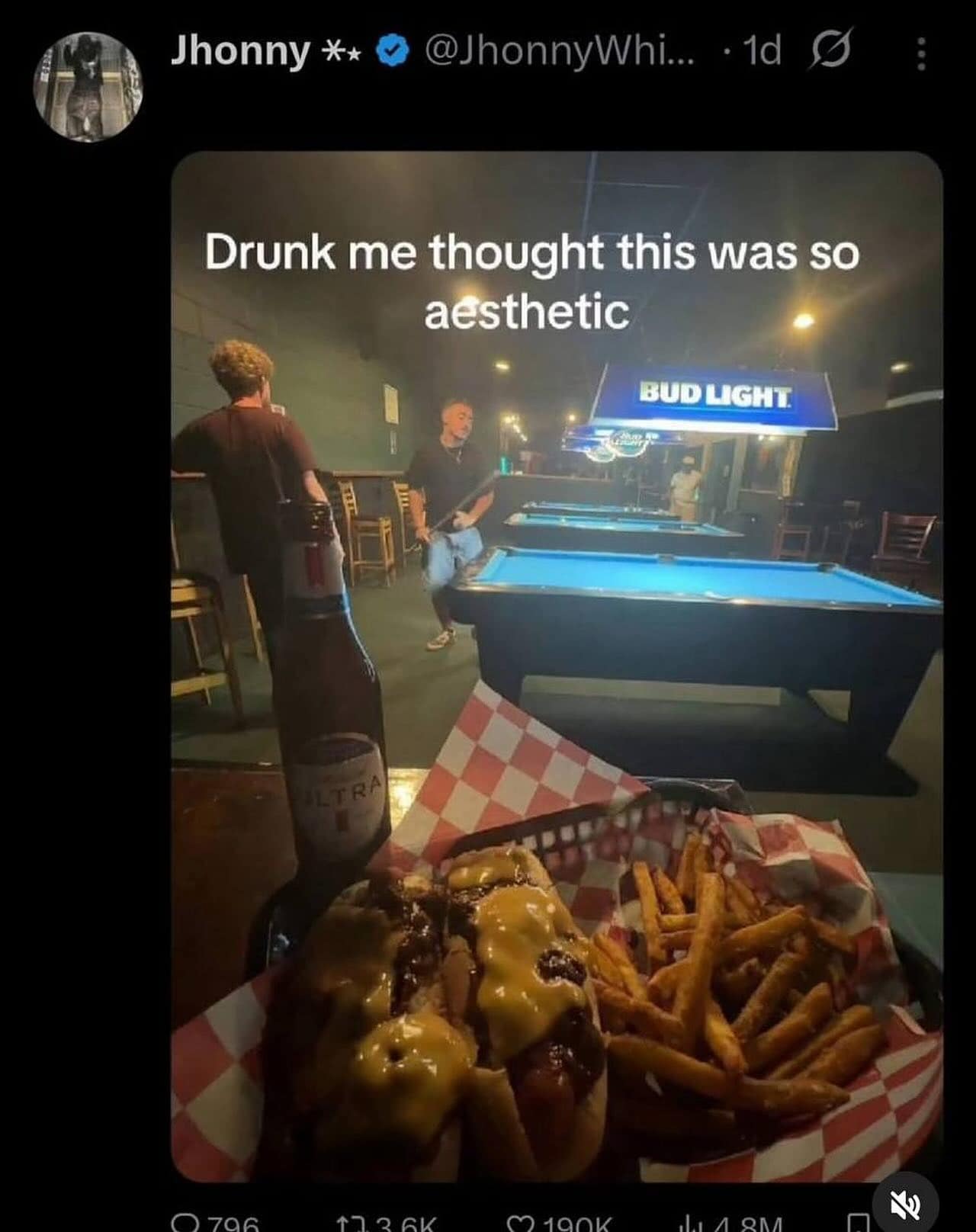 A funny, blurry, and chaotic photo taken from a bar, which the user on Twitter explains that their "Drunk me thought this was so aesthetic."