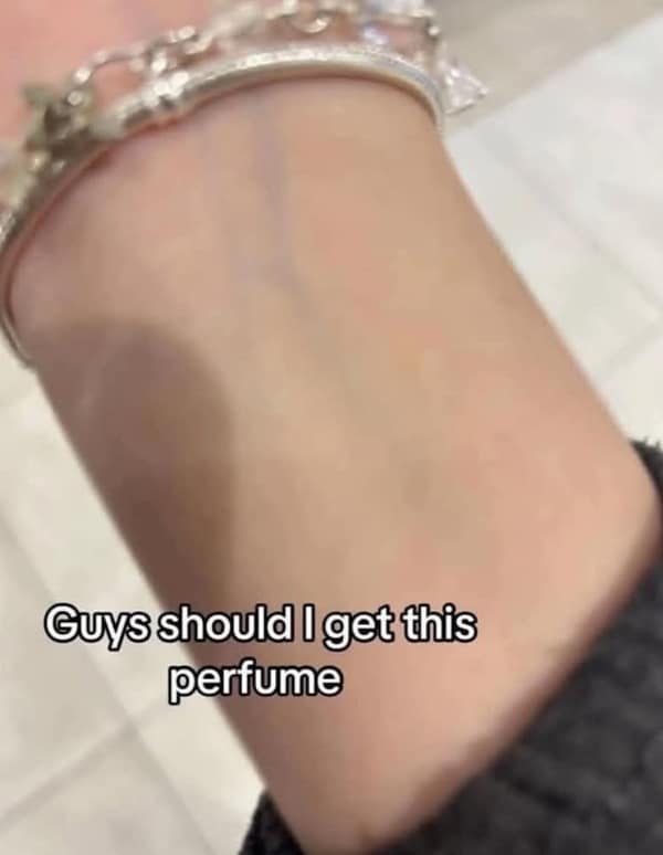 A funny picture of a person's arm where a vein looks exactly like the iconic Nike swoosh logo.