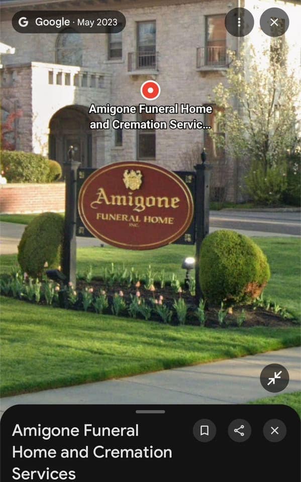 A funny picture of a real funeral home with the very unfortunate and hilarious name "Amigone Funeral Home."