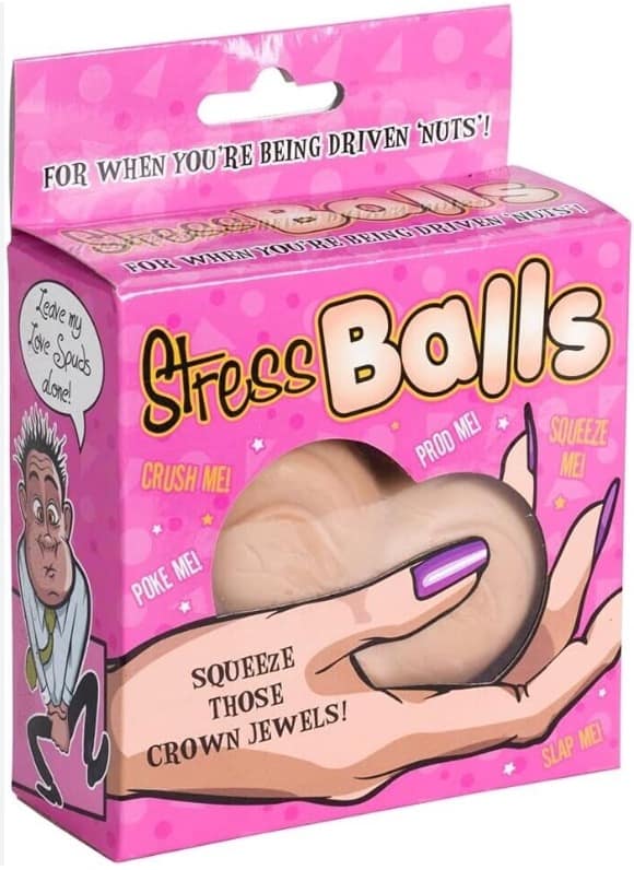 A photo of a bizarre and hilarious gag gift, which is a stress ball that is shaped like a pair of human testicles, with the funny packaging that reads "Squeeze those crown jewels!".