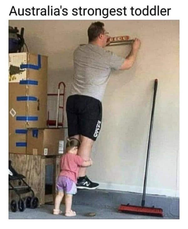 A funny meme titled "Australia's strongest toddler" showing a girl seemingly holding up a grown man.