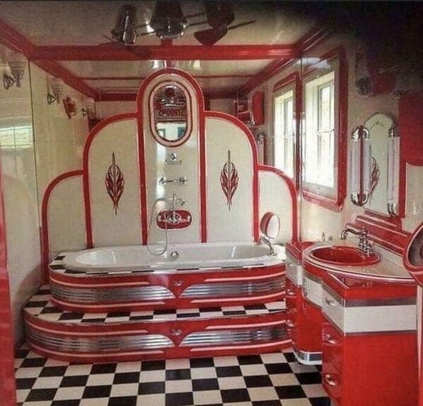 Retro red-and-white bathroom with checker floors and multi-step platform tub.