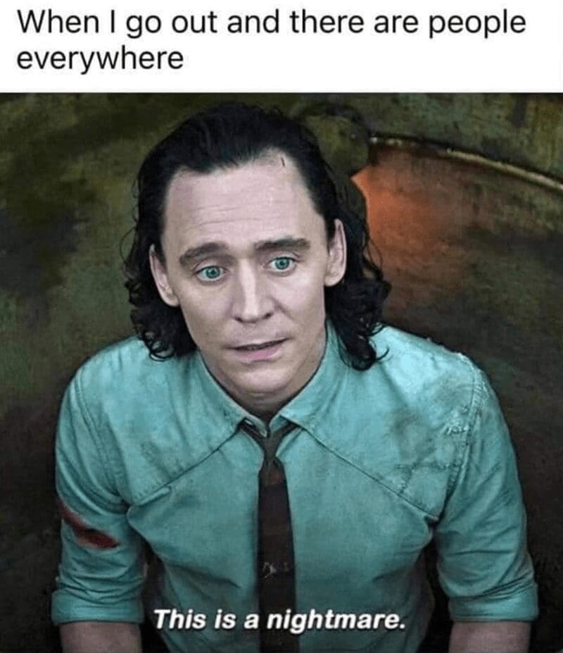 A relatable introvert meme with Loki from Marvel calling a crowded place a complete and total nightmare.