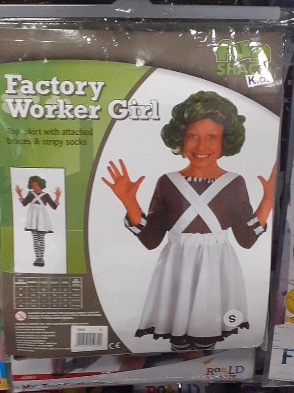 A creepy-looking, knock-off Oompa Loompa Halloween costume from the movie Willy Wonka & the Chocolate Factory that has been generically renamed to "Factory Worker Girl."