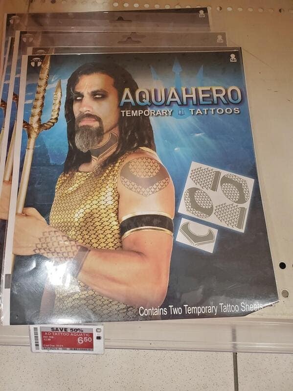 A package of temporary tattoos for a knock-off version of a DC Comics Aquaman costume, where the superhero character has been renamed to "Aquahero."