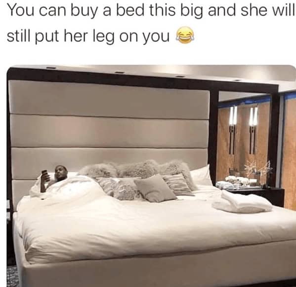 A marriage meme showing that even in a huge bed, a wife will still put her leg on her husband.