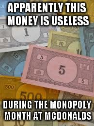 A funny McDonalds Monopoly meme showing that regular Monopoly money is useless during the promotion.