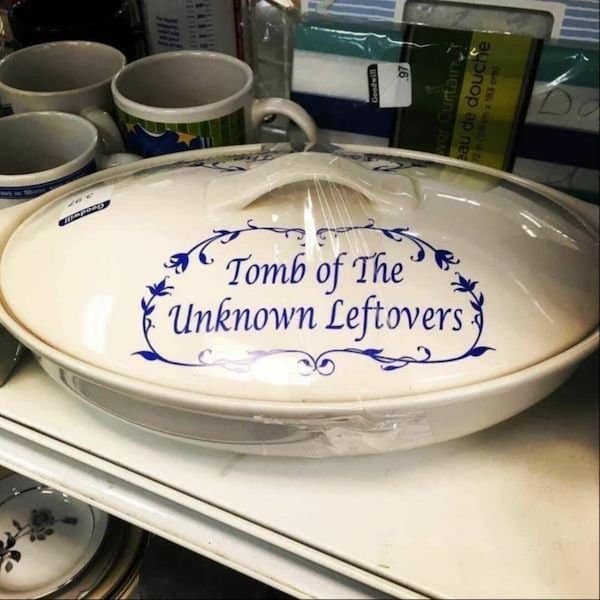 A hilarious meme of a thrift store casserole dish labeled "Tomb of The Unknown Leftovers."