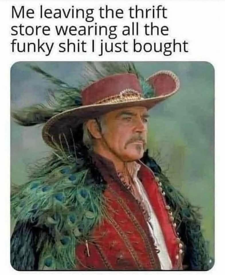 A meme dump image of a man in a fabulous peacock feather outfit after thrift shopping.
