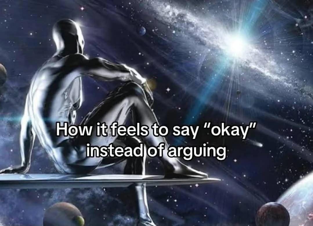 Chrome-skinned figure sits on a ledge in outer space, gazing at a bright galaxy; overlaid text reads “How it feels to say ‘okay’ instead of arguing.”