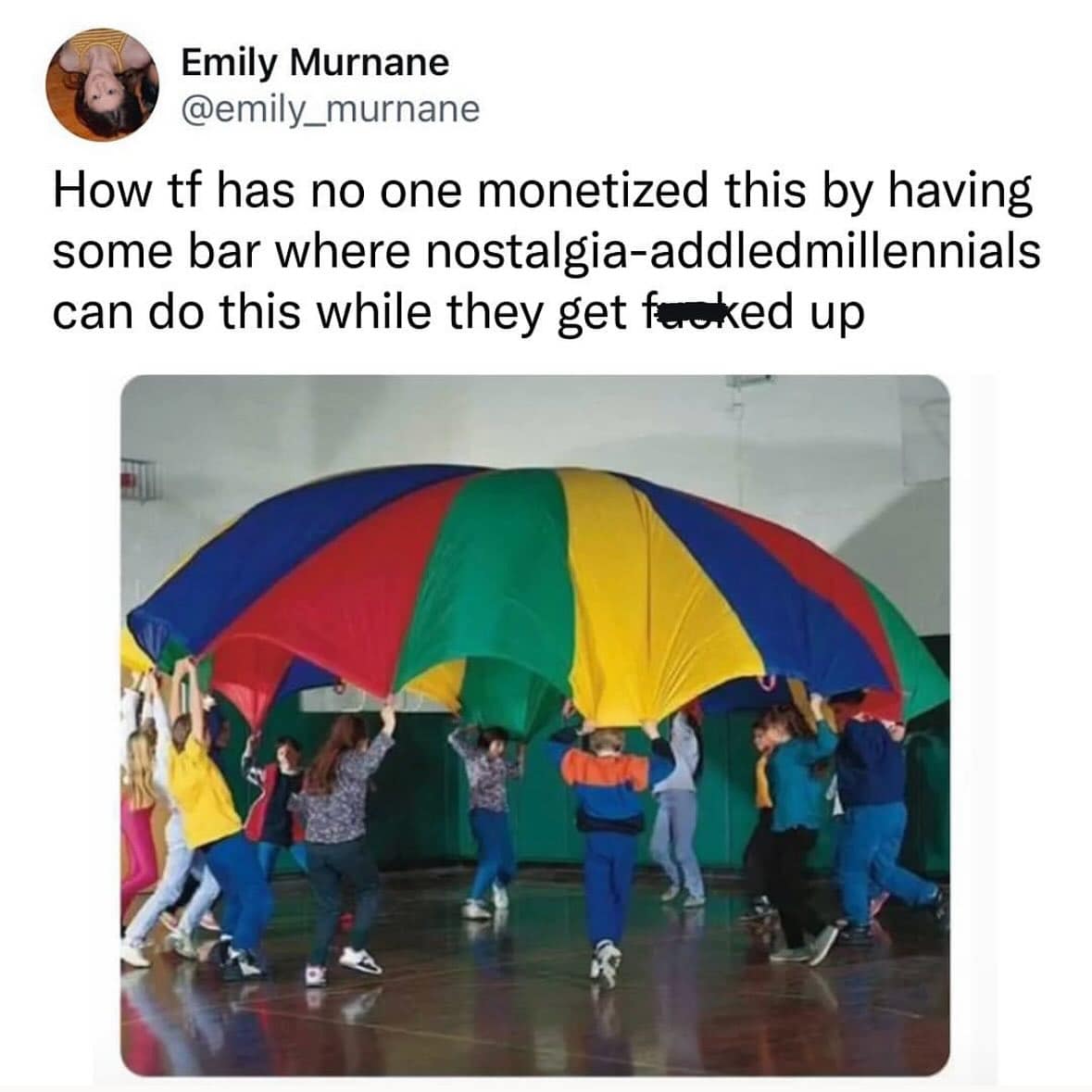 Tweet about turning the elementary-school rainbow parachute game into a bar activity; kids lift a colorful parachute in a gym.