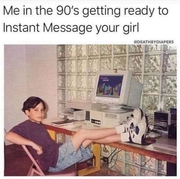 ’90s kid leans back at a desk with feet up near a bulky CRT computer; caption says “Me in the 90’s getting ready to Instant Message your girl.”