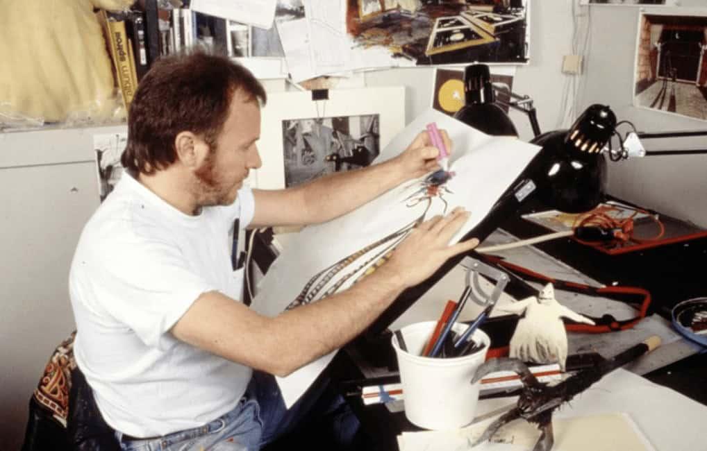 Director Henry Selick drawing concept art for The Nightmare Before Christmas at his desk during the movie's production.