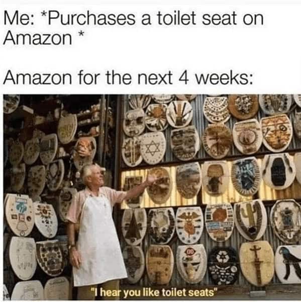 Store wall covered with decorative toilet seats; caption jokes Amazon keeps recommending them after one purchase.