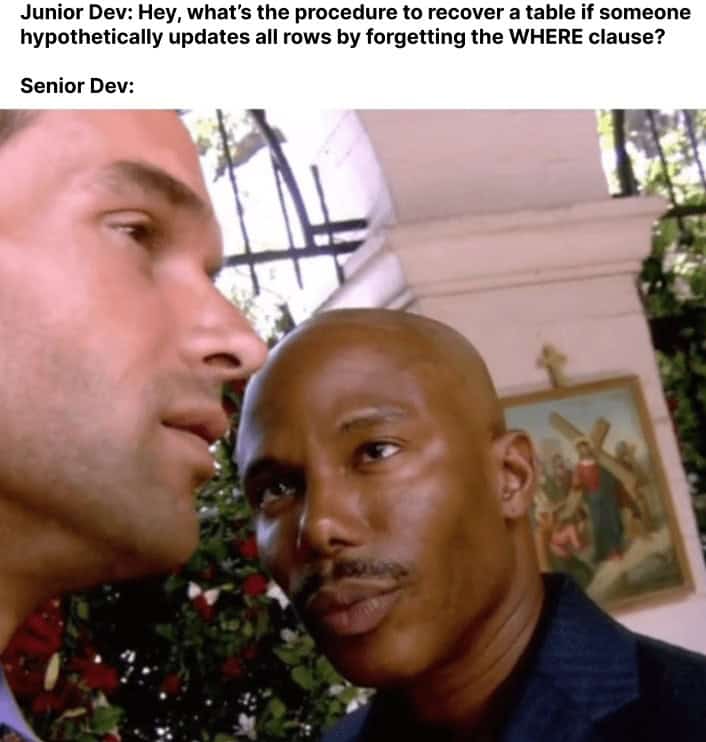 A programmer meme showing a senior dev's horrified reaction to a junior dev asking about a major database error.