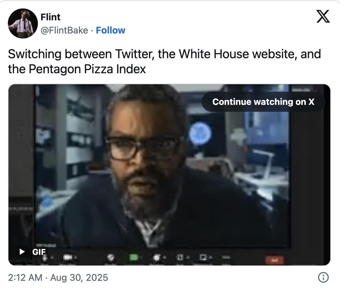 Tweet showing a man on a computer, caption about checking Twitter, the White House site, and the “Pentagon Pizza Index.”