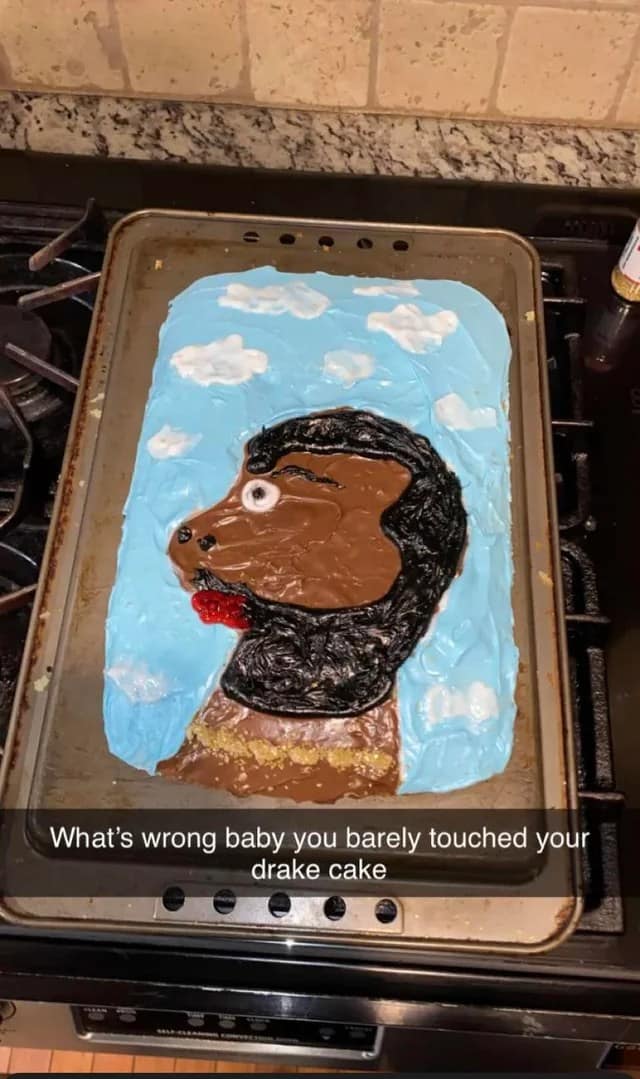 A "What's wrong babe" meme with a hilariously bad cake attempting to look like the rapper Drake.
