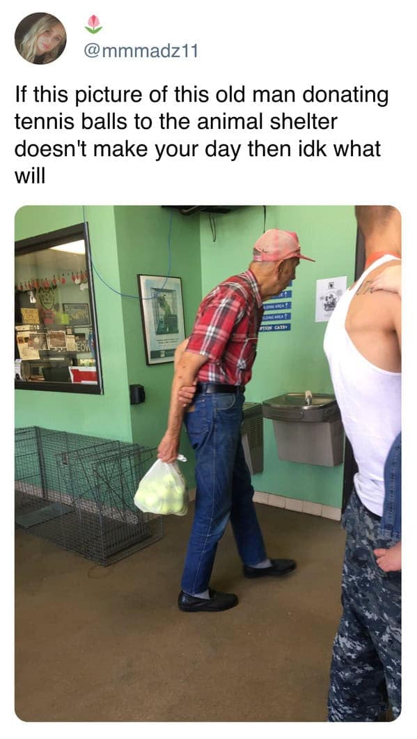 A touching photo of an elderly man carrying a large bag of tennis balls to donate to an animal shelter.