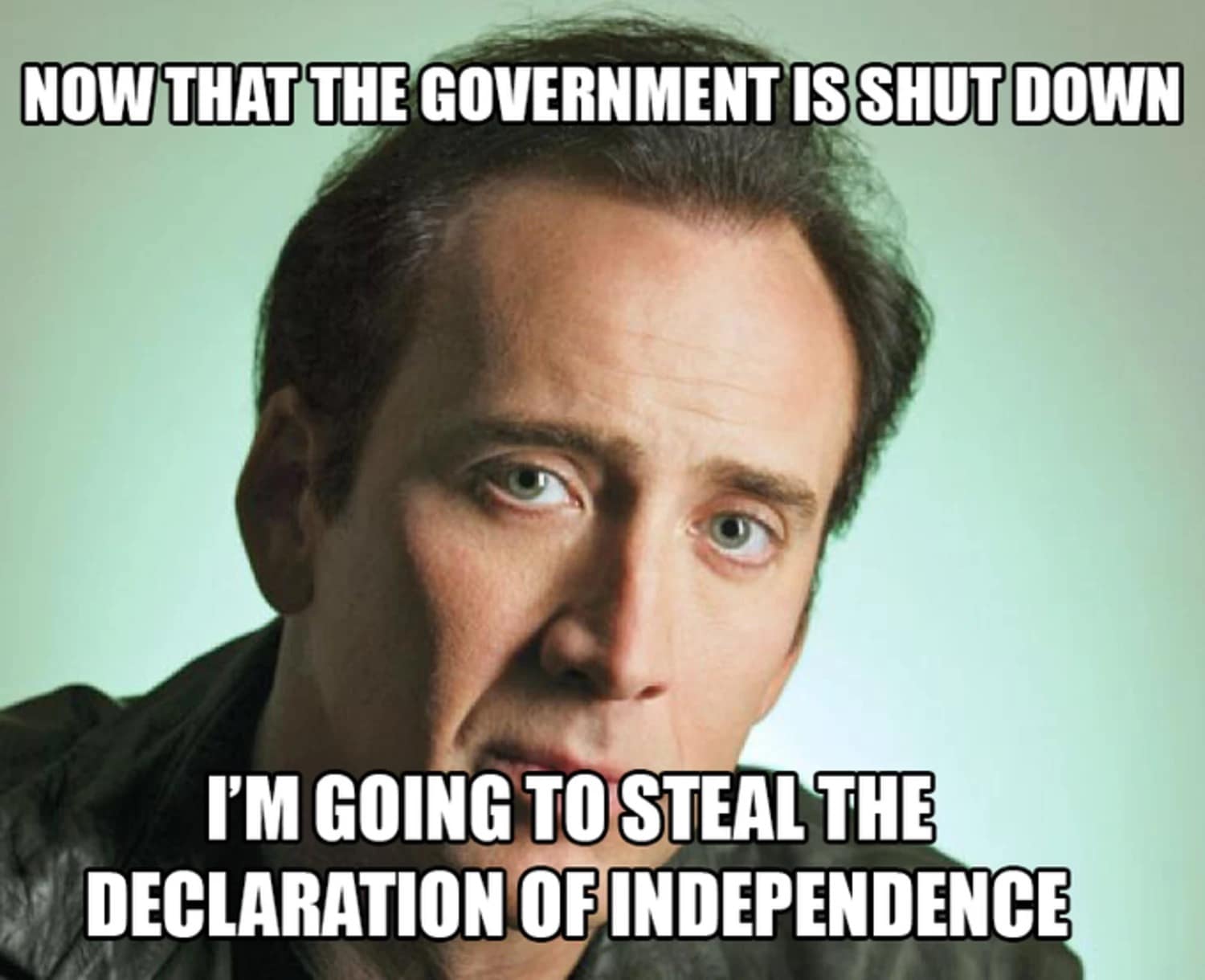 A funny 2025 government shutdown meme suggesting Nicolas Cage will use the opportunity to steal the Declaration of Independence.
