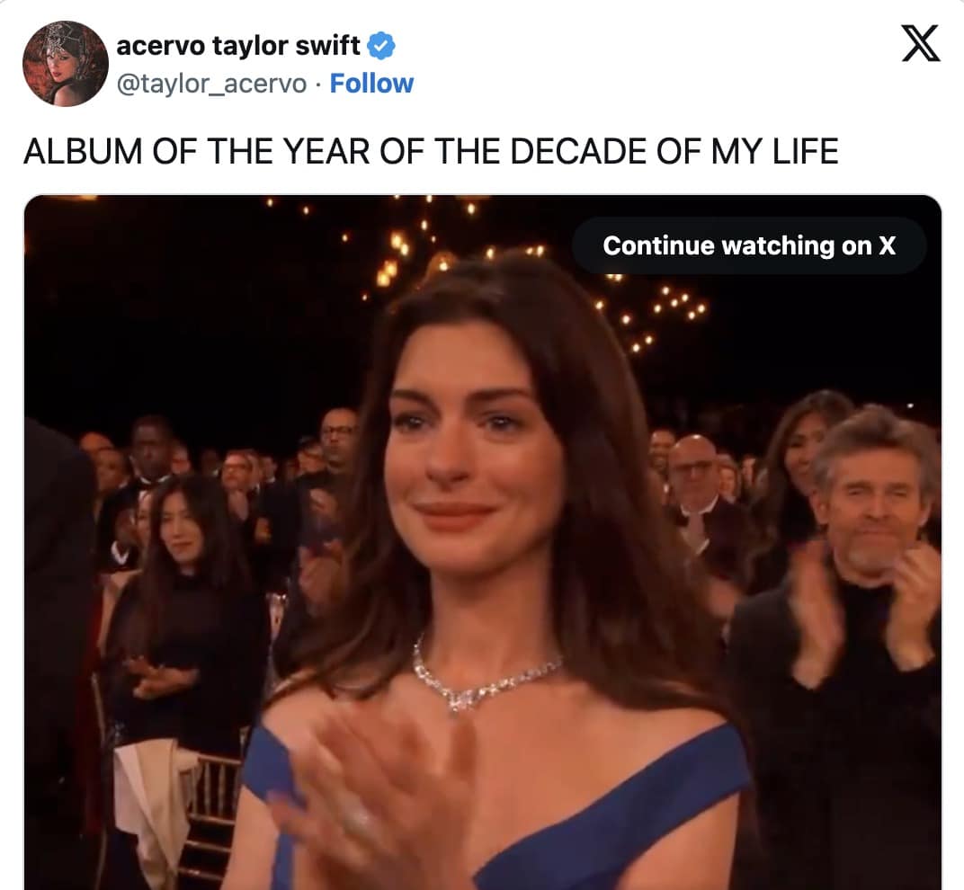 A Taylor Swift meme of Anne Hathaway emotionally applauding to represent fans' reactions to "The Life of a Showgirl."