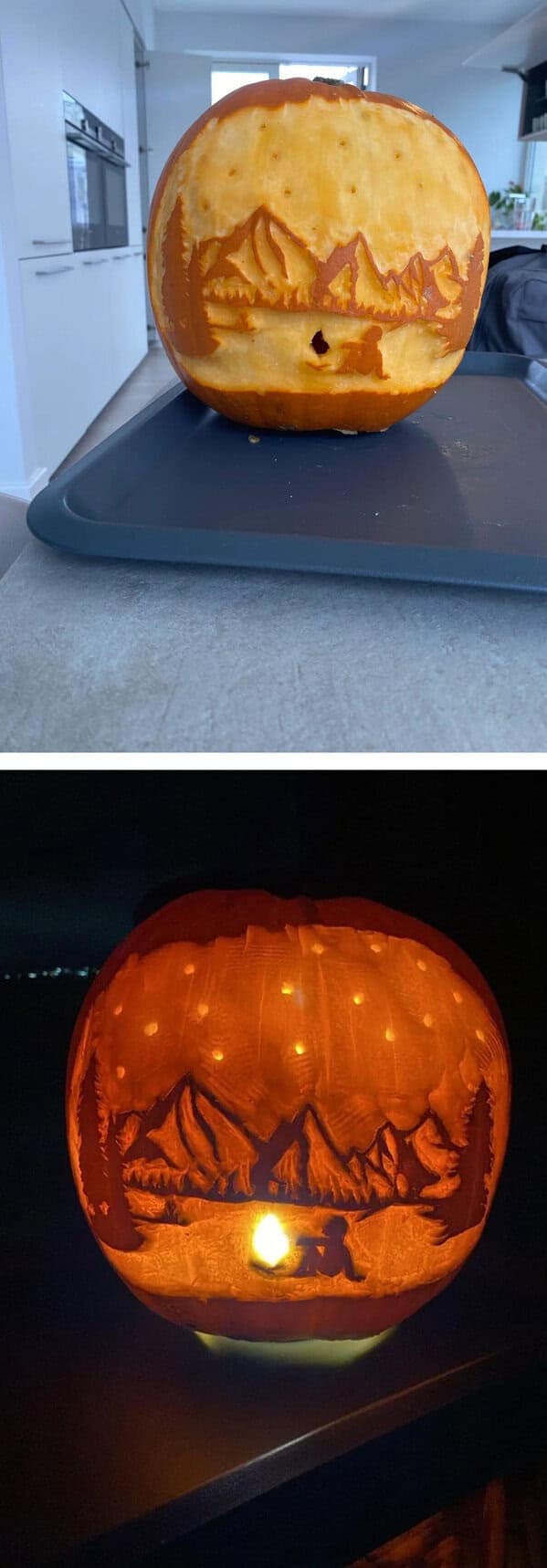 An amazing pumpkin carving showing a detailed mountain landscape scene lit with tiny star-like lights