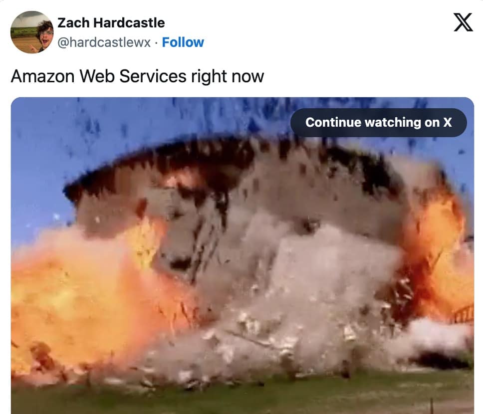 An AWS outage meme using a GIF of a house exploding to represent Amazon Web Services right now