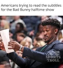 A bad bunny halftime show meme with Jimmy Butler squinting at a paper to represent Americans trying to read the subtitles.