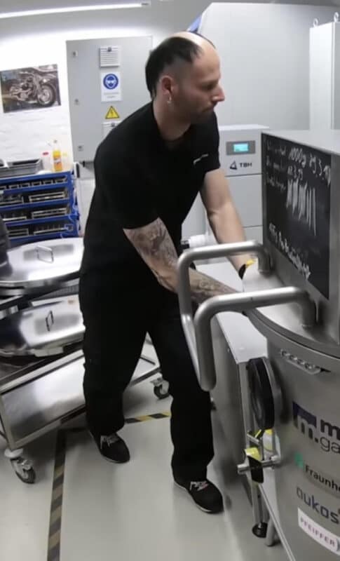 A truly wild example of bad haircuts, combining a bald head with a long, flowing mohawk.