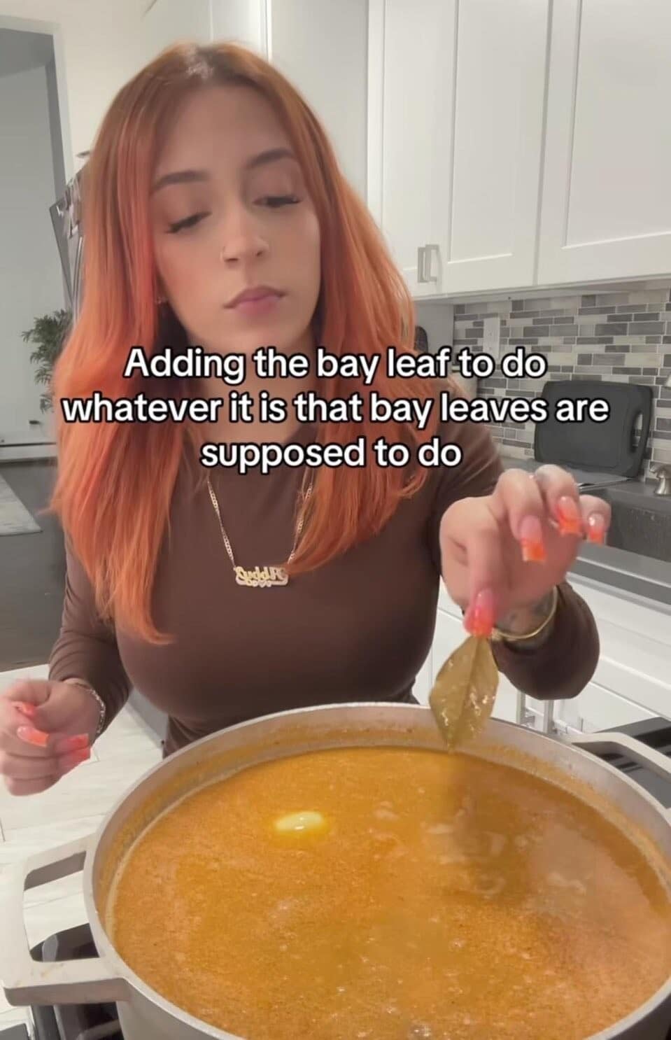 A classic meme showing a woman adding a bay leaf to soup, admitting she doesn't know what it does.