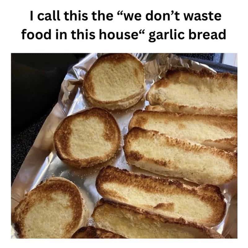 Toasted hamburger and hot dog buns repurposed as garlic bread on a baking sheet.