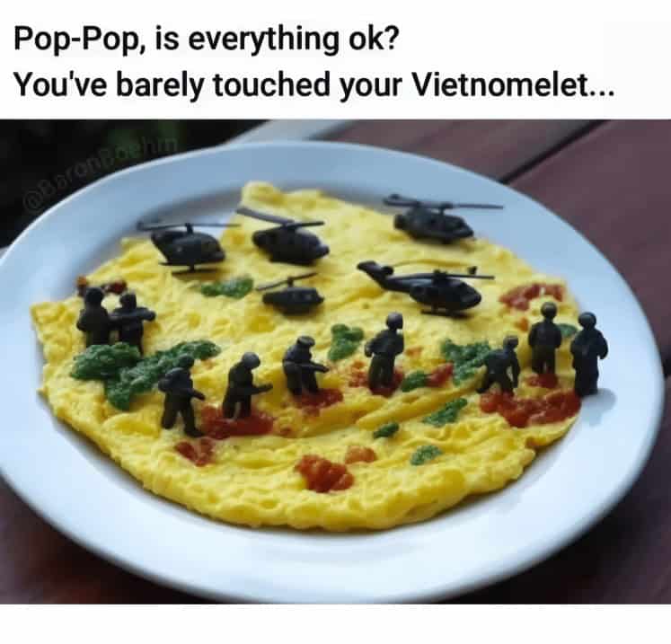 A dark humor cooking meme showing an omelet decorated with toy soldiers and helicopters, called a "Vietnomelet."