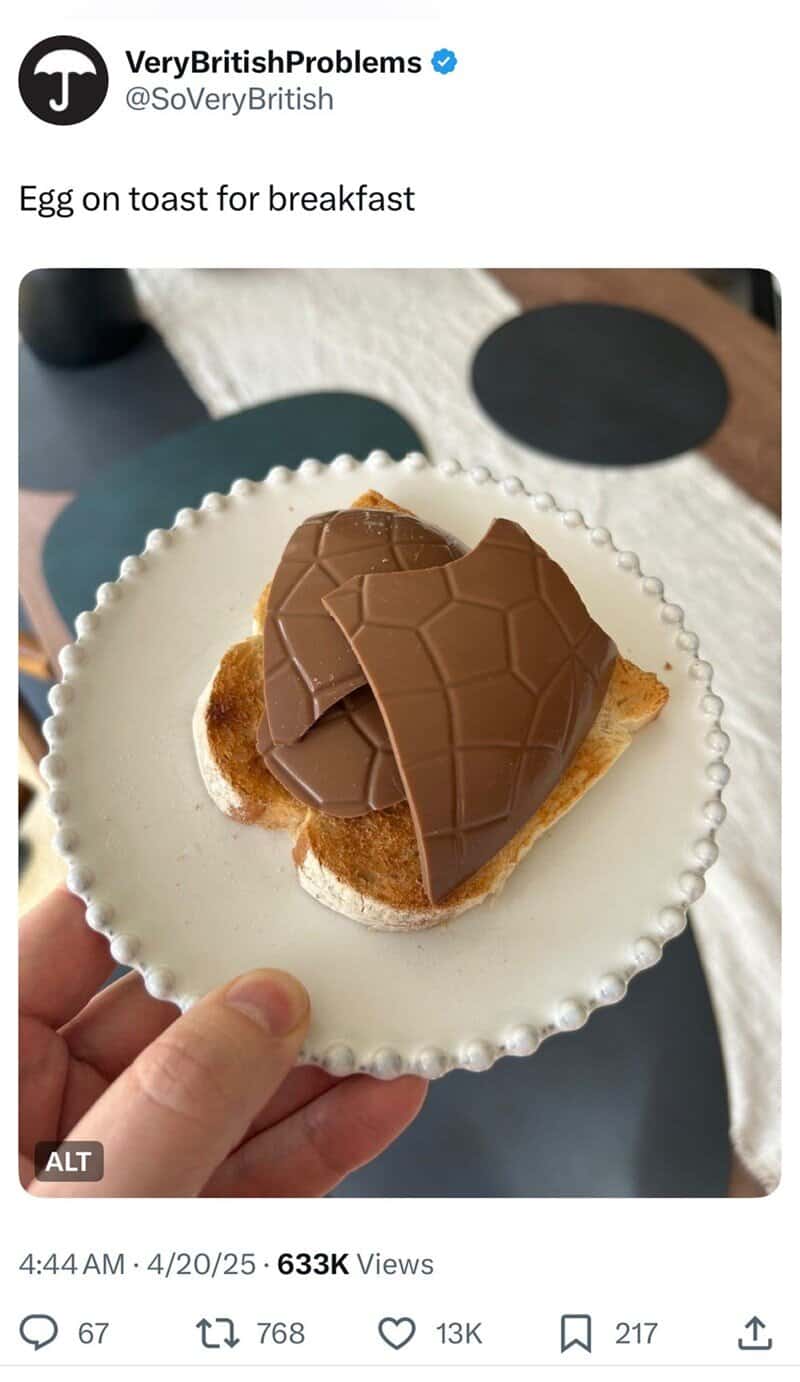 A piece of toast topped with broken pieces of a chocolate Easter egg, presented as "Egg on toast."