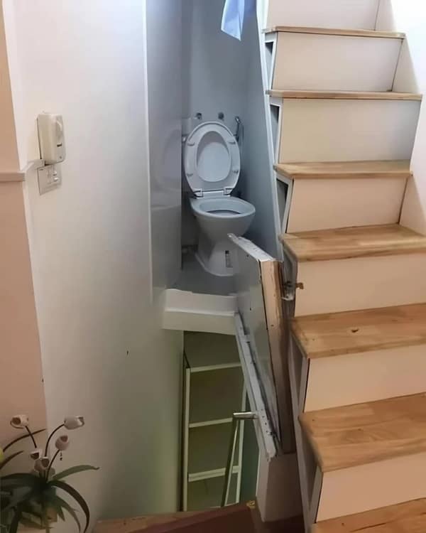 A hilarious DIY fail showing a toilet installed in a tiny,