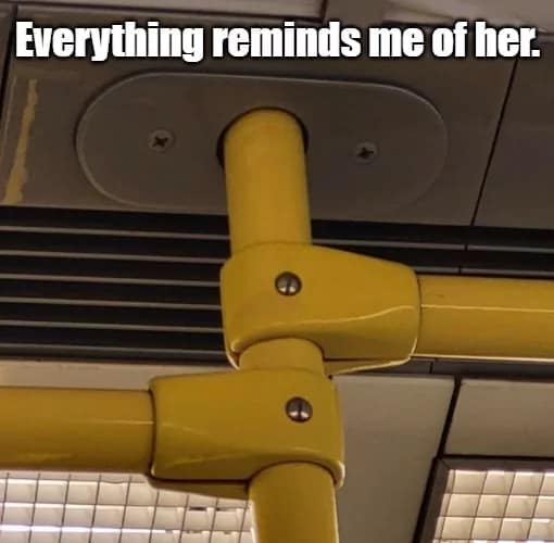 A funny meme of yellow bus poles and connectors that have a distinctly phallic appearance.