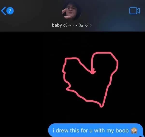 A funny flirty meme showing a text message of a heart drawn with an unconventional method.
