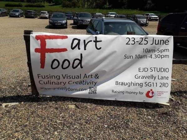 A hilarious food meme showing a banner for an "Art & Food" festival that looks like it says "Fart Food."