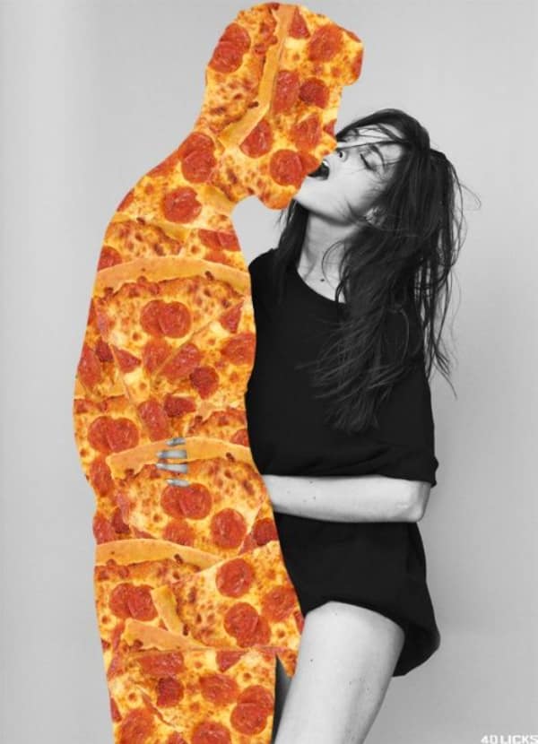 A funny food meme of an art piece showing a woman passionately kissing a man made entirely of pepperoni pizza.