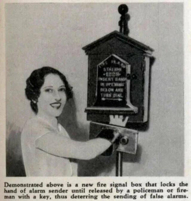 Funny fail photo showing a vintage fire alarm box designed to trap the user's hand until police arrive