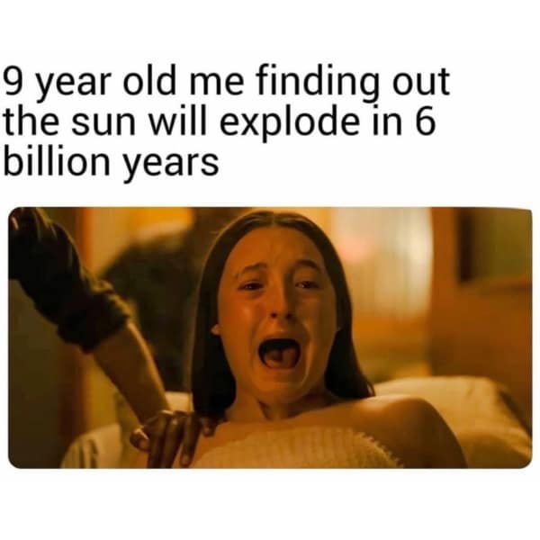 A meme of a terrified girl crying, representing a child's existential dread about the sun eventually exploding.