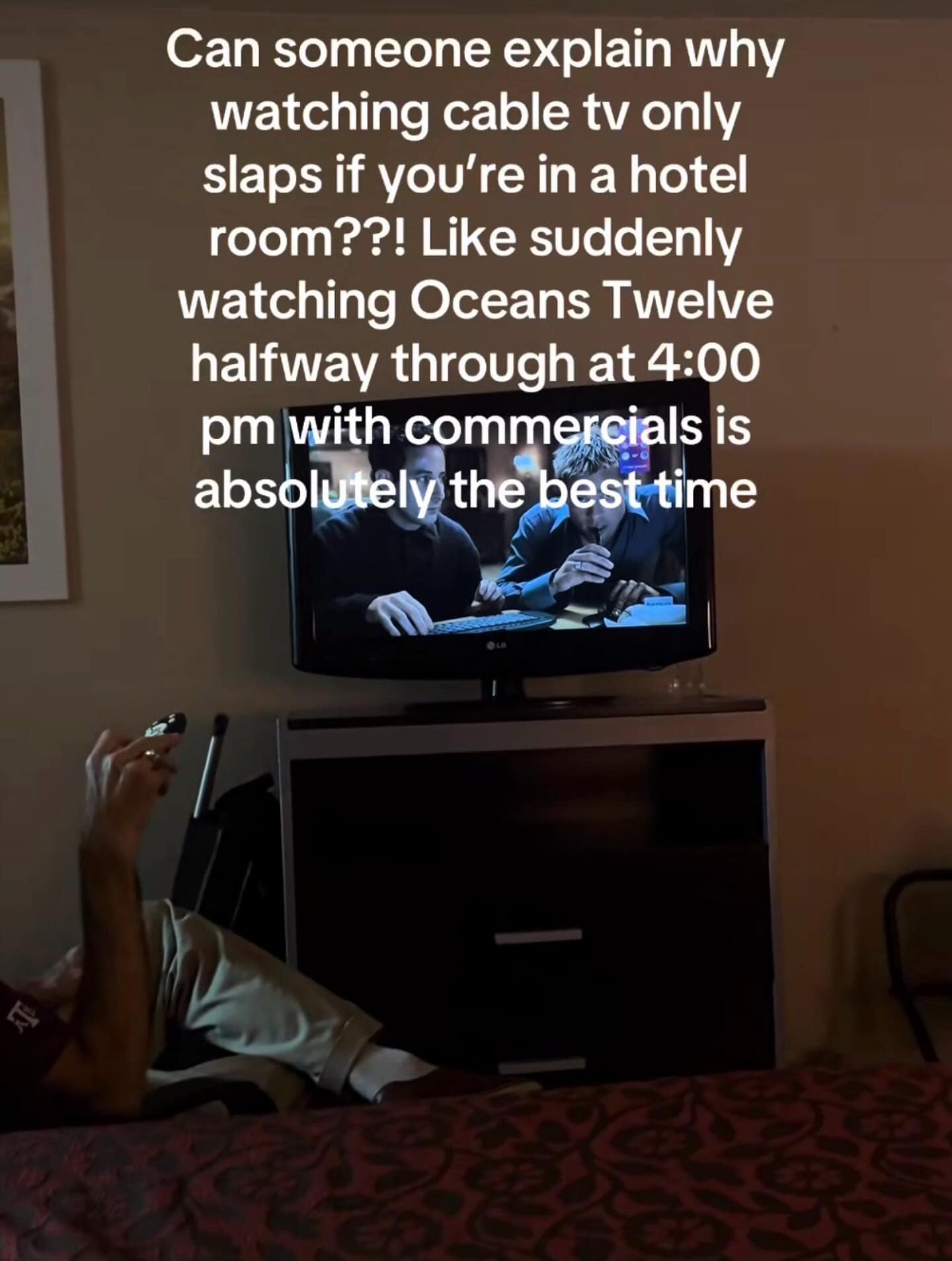 Funny memes post describing the unique joy of watching random cable TV movies in a hotel room.